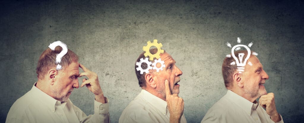 Emotional intelligence. Side view of an elderly man thoughtful, thinking, finding solution with gear mechanism, question, lightbulb.